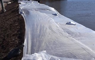 geomembrane installed as a Temporary erosion blankets on bank
